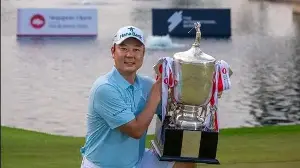 Overnight leader Ham braves conditions to win Singapore Open