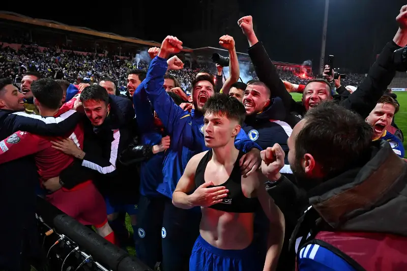 Esmir Bajraktarevic celebrates after his penalty took Bosnia and Herzegovina to the World Cup. 