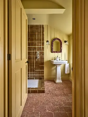 This Is Why Designers Are Loving Butter Yellow for Bathroom Designs Right Now — "It's Softer, and More Inviting," They Say