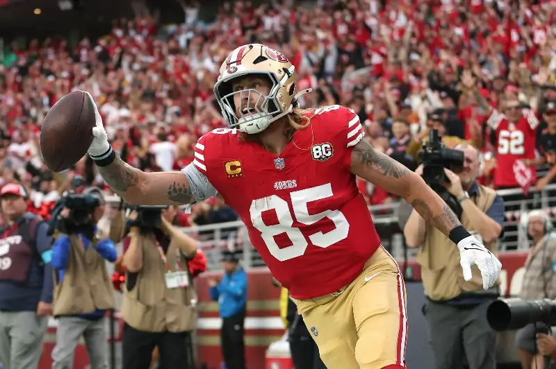 George Kittle #85 of the San Francisco 49ers celebrates after scoring an 11 yard touchdown against the Washington Commanders during the first quarter of the game at Levi's Stadium on October 19, 2026 in Santa Clara, California. (Photo by Lachlan Cunningham/Getty Images)