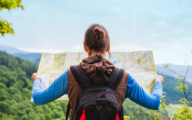 A traditional paper map can prove to be a critical backup, as it doesn’t rely on battery power - Wojciech Kozielczyk/iStockphoto