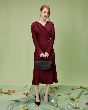 Master the deep red shade, evoking an air of sophisticated power.