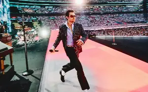 Harry Styles evokes Hockney for stadium art with a human centre