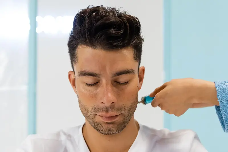 Male aesthetics is moving from vanity to maintenance. The goal is not to make the face look treated, but to improve skin quality while preserving identity,