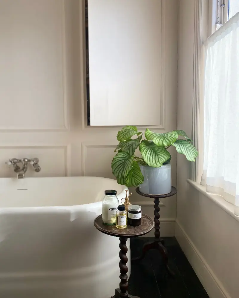 Adding a hidden door along from a chimney breast can create elegant storage without reducing the useable floorspace of a bathroom,
