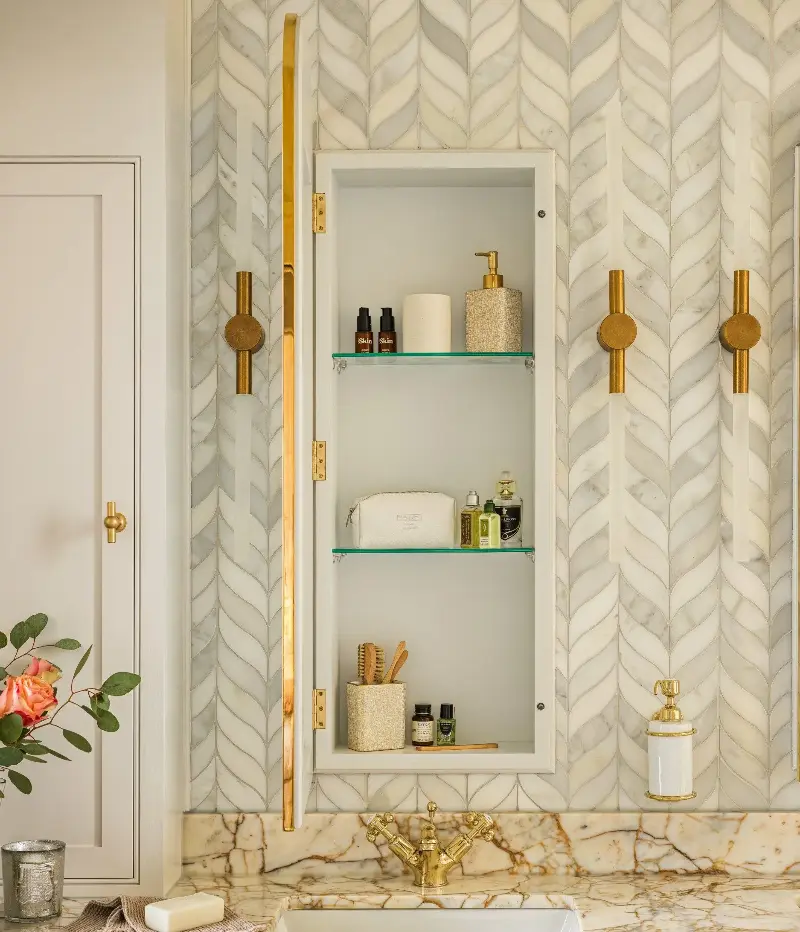 If you have to pull a wall forward to accommodate plumbing, ‘it’s actually making good use of the space that otherwise would just get lost’ to add a built-in storage space with a mirrored door - Simply Bathrooms & Interiors/Adam Carter