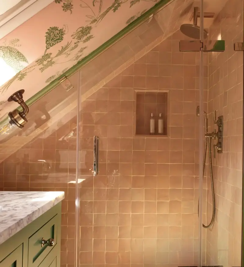 Creating a built-in space for your shower essentials looks far more chic than a cluster of bottles and razors on the floor or in a metal caddy