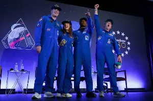 Artemis II's moon-traveling astronauts return home to cheers after a record-breaking trip