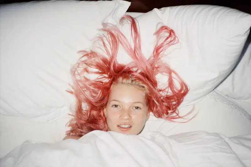 The featured work of the exhibition, this image has come to define the decade with its iconic composition and simplicity.  (Image credit: Juergen Teller, Young Pink Kate London 1998 (c) Juergen Teller, All Rights Reserved (2))