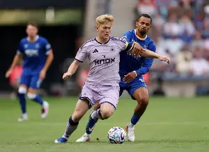 Manchester United are focusing their efforts on signing Lewis Hall after completing the Carlos Baleba deal.