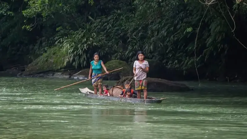 People on a river in Choco, Colombia