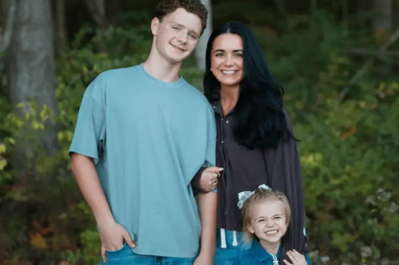 From left: William, 12, Paige Bramlett, 30, and Leni, 3.