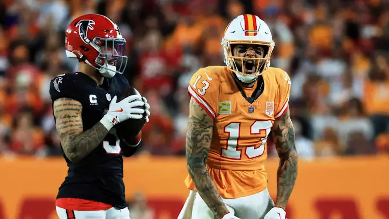 Mike Evans reacts after catching a pass against Atlanta Falcons safety Jessie Bates III during the third quarter.