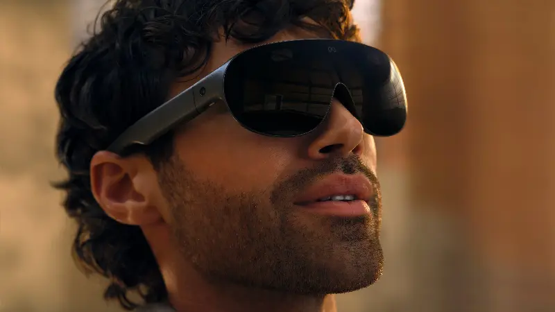 Meta's new VR glasses –&nbsp;which are attached to a puck that sits in the pocket and allows them to weigh five times less than their predecessor (Meta)