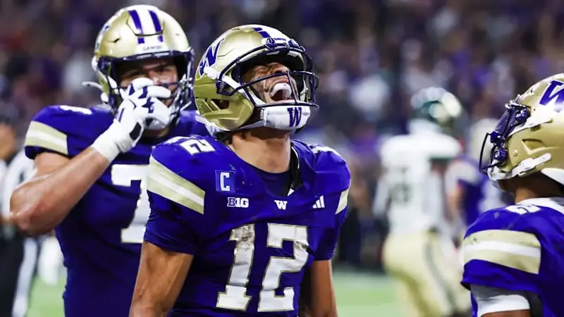 Boston celebrates after catching a touchdown pass against the Colorado State Rams during the third quarter at Husky Stadium. 