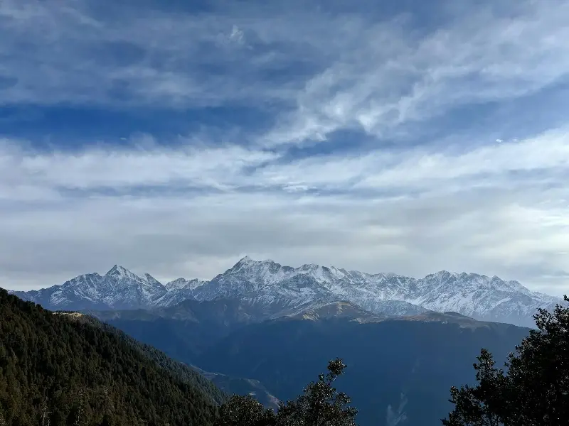 Majestic view of the snow-capped Himalayan peaks in Chamoli, Uttarakhand.