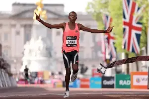 Kenyan breaks 2-hour marathon barrier by 30 seconds