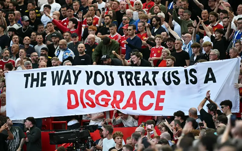 Large United support organisation The Red Army unfurled a giant banner on behalf of “maligned, vilified, misrepresented” fans at the derby game against City - AFP/Paul Ellis