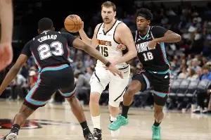 NBA: Grizzlies surprise Nuggets with gritty defense late