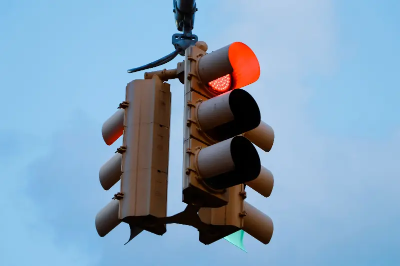 The red 'stop' light is visible over the greatest distance. 