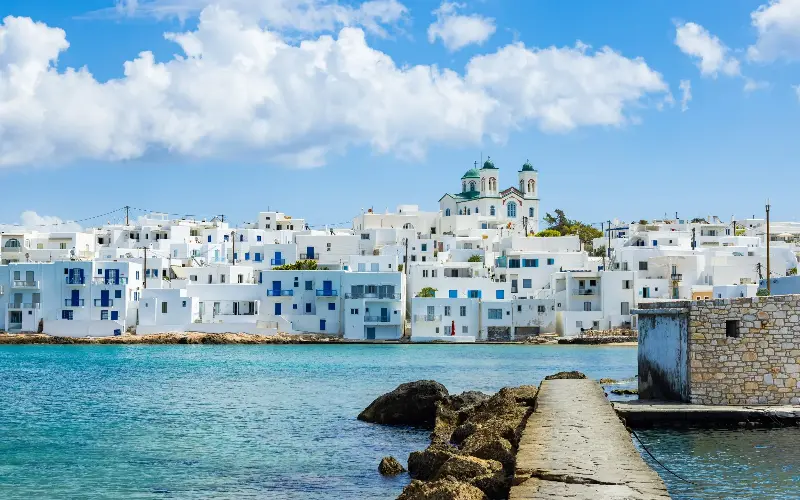 Naoussa’s blue seas and white homes look like something from the Mamma Mia! film - mbbirdy/iStockphoto