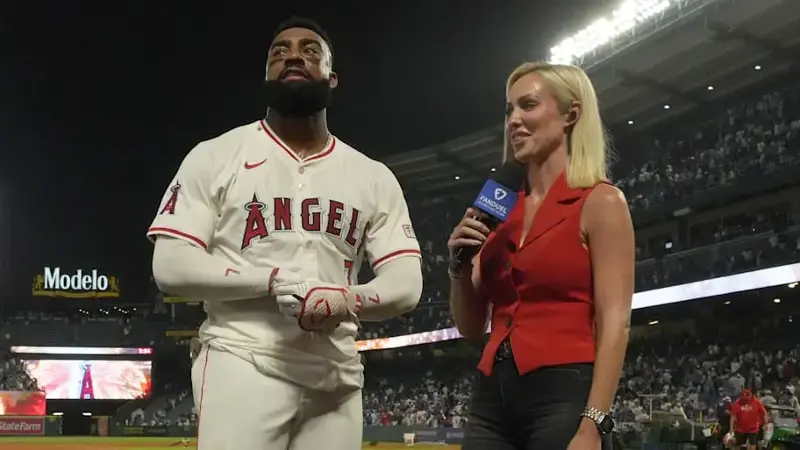 FanDuel Sports Network reporter Erica Weston (right) interviews Los Angeles Angels right fielder Jo Adell