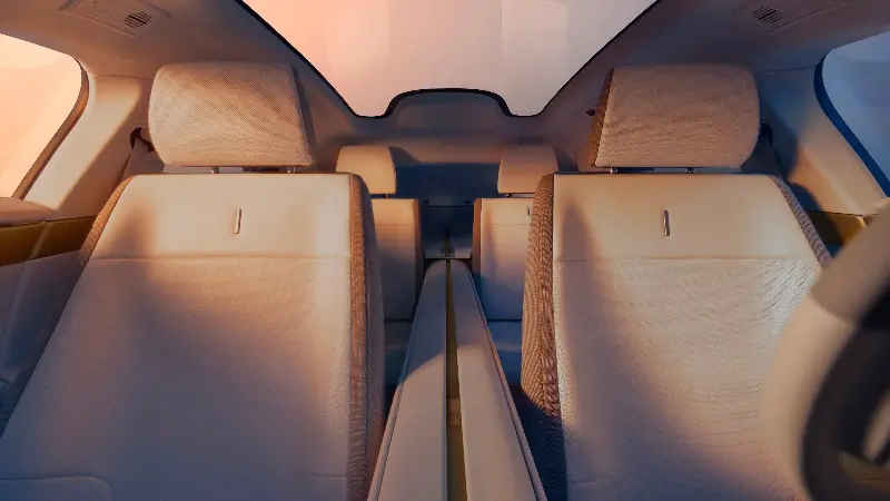 The Jaguar Type 01 features minimalist seats front and rear, a strong brass-trimmed centre spine, a long panoramic glass roof and no rear screen (Jaguar)
