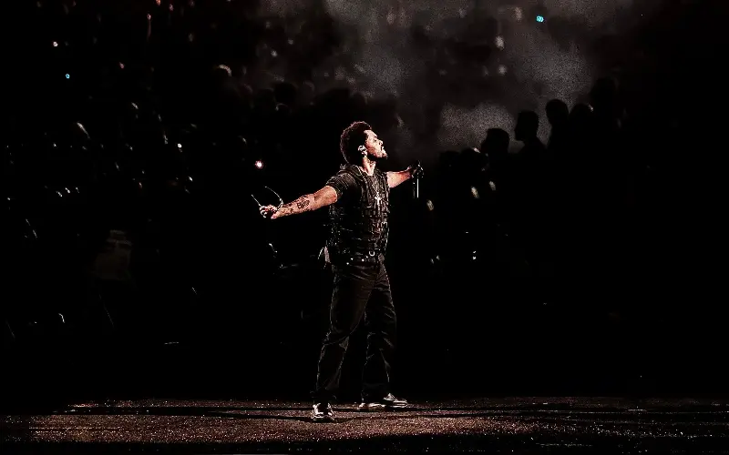 The Weeknd performing on stage at Wembley Stadium in London - Sebastien Nagy