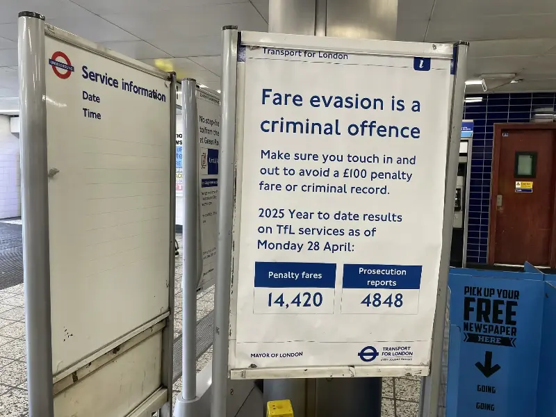 A TfL poster on the Underground warning that fare evasion is a criminal offence (Ross Lydall)