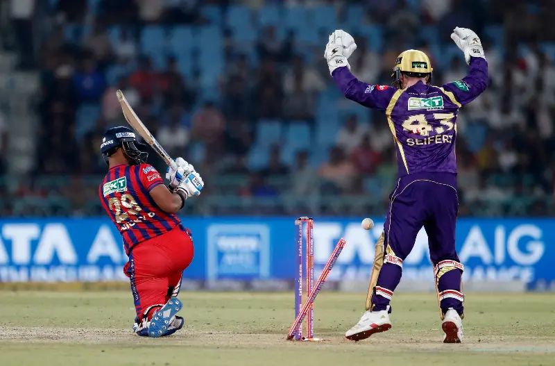Lucknow Super Giants' Nicholas Pooran is bowled out by Kolkata Knight Riders' Sunil Narine during the super over.