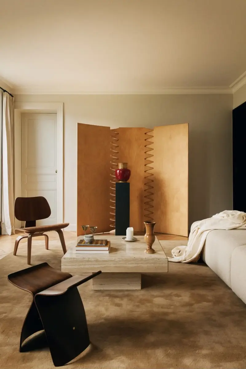 The client’s antique red ceramic family heirloom has been given a place of its own on a pedestal.Design: Diettert Collet, Photography: Clément Gérard