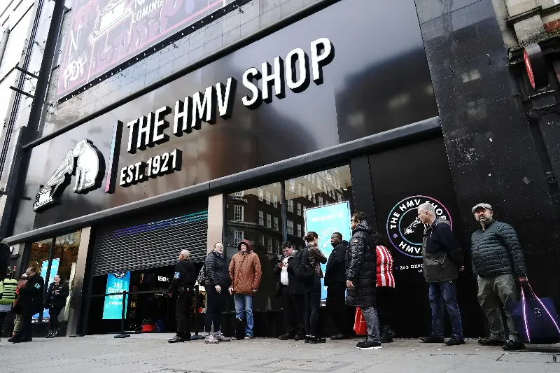 Members of the public queue up outside the new HMV store on Oxford Street (PA Archive)