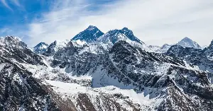 Above 26,000 feet on Mount Everest — in the death zone where the air contains roughly one-third the oxygen of sea level — climate change is melting the ice that has buried more than 200 frozen climbers, and Nepali army teams recovering them in 2024 also removed approximately 11 tonnes of trash, in a quiet revelation that the highest place humans have ever reached is also a slowly emerging landfill