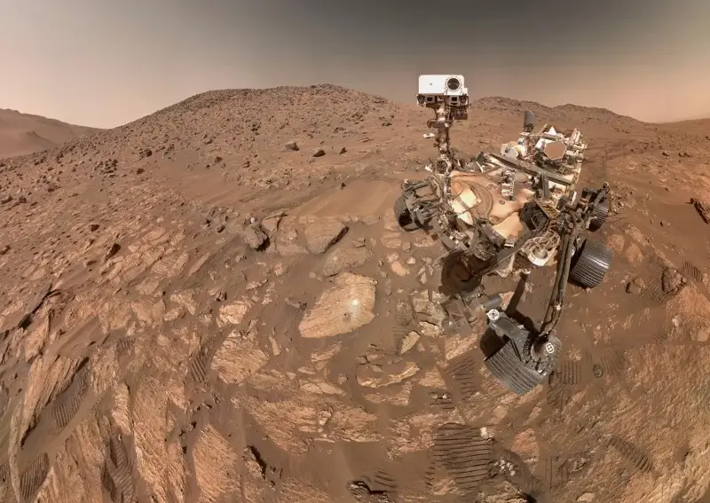 The Perseverance rover taking a selfie on July 23, 2024. Cheyava Falls appears to the left of the rover, near the center of the image.