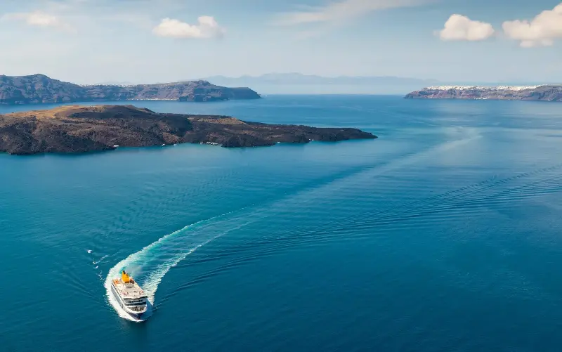 Ferry arrives at the port of Santorini Island, Greece