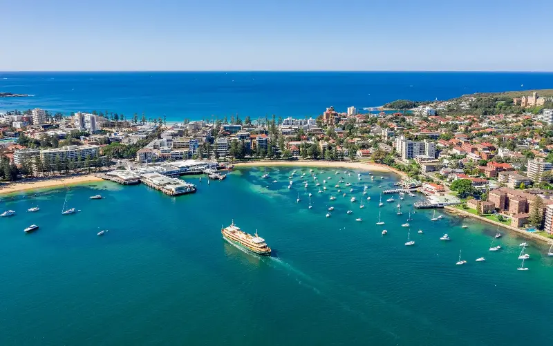 Manly Wharf sits roughly a 30-minute ferry ride away from Circular Quay - kontrymphoto/iStockphoto