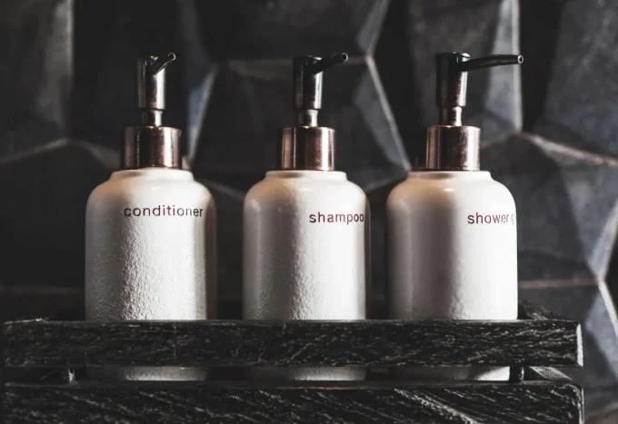 Hotel bathroom amenities are usually refilled after guests have used them.