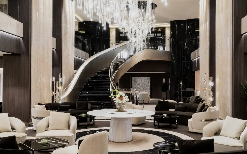 Explora III’s lobby features hand-blown Venini chandeliers - Explora Journeys