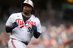 Twins eliminate Rangers from playoff race with 6-4 win in season finale