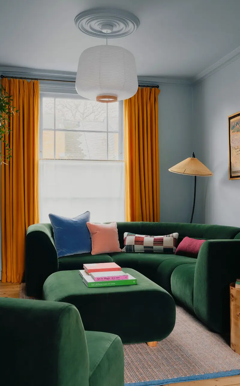 Designer Lizzie Green found an orange-and-blue pairing to be uplifting for a north-facing room