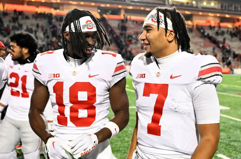 COLLEGE PARK, MARYLAND - NOVEMBER 19: Marvin Harrison Jr. #18 and C.J. Stroud #7 of the Ohio State Buckeyes celebrate a victory against the Maryland Terrapins at SECU Stadium on November 19, 2022 in College Park, Maryland. (Photo by G Fiume/Getty Images)
