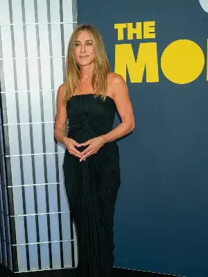 Jennifer Aniston 'is very happy with Jim Curtis'