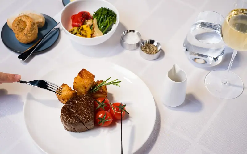 BA’s “from the grill” service allows first-class passengers to order meat and fish, with all the trimmings, on demand - British Airways