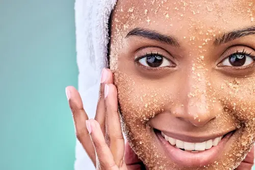 With an exfoliating scrub, remove impurities.