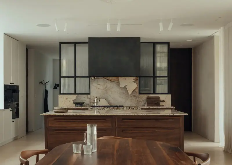 Think of your statement material as a work of art — it certainly works here, being framed with a symmetrical layout. (Image credit: Jim Stephenson. Design: Oliver Leech Architects and Ca' Pietra )