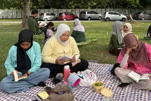 Need a break from scrolling? Terengganu’s silent reading picnic offers a quiet escape