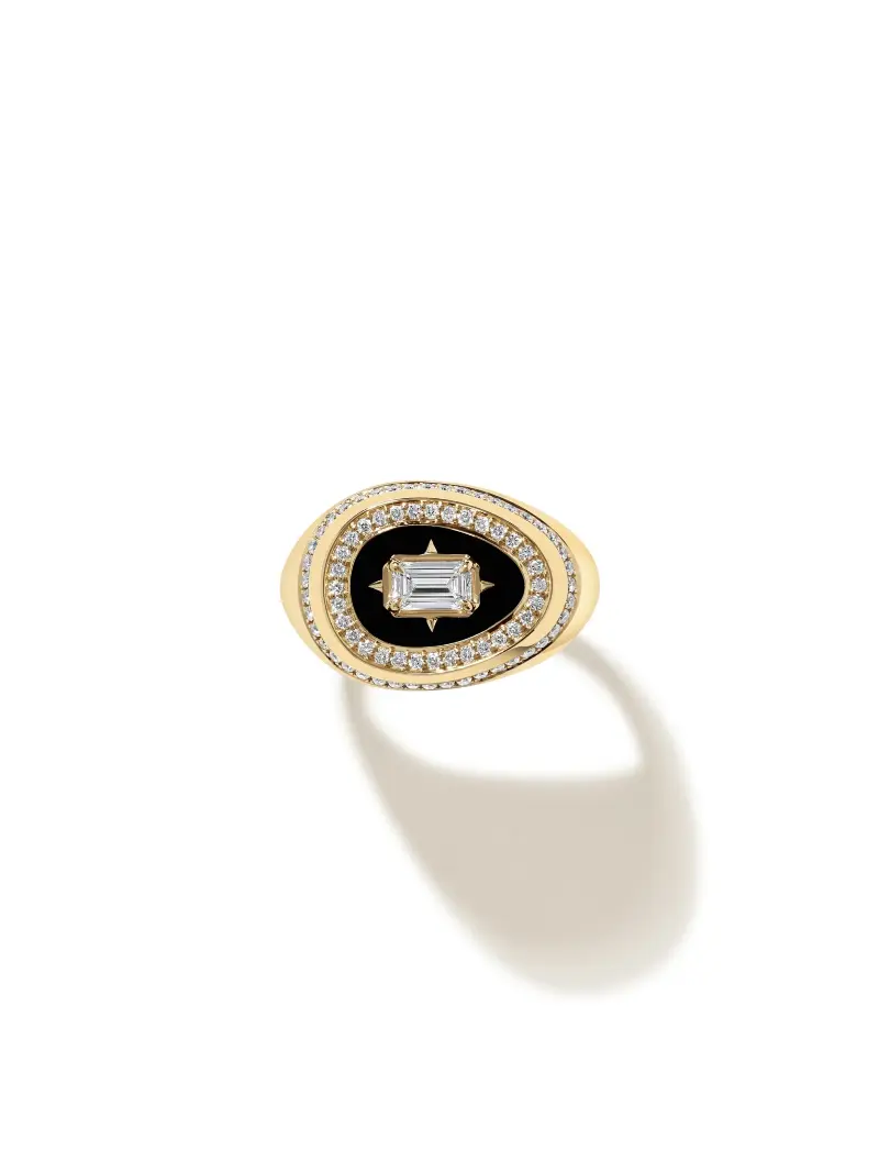 The State Property Cosmic Egg Jet Black Signet Ring in yellow gold with a black centre, pavé diamond halo and emerald-cut diamond