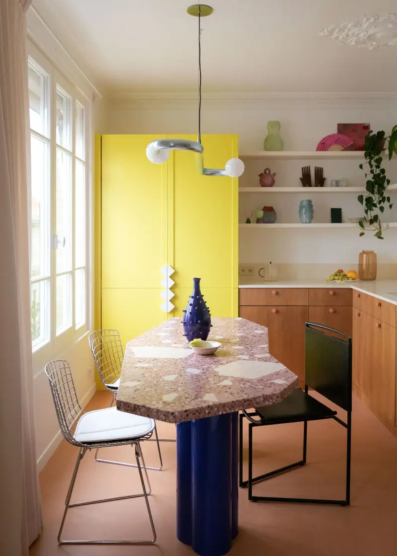 The yellow joinery in this kitchen was painted with Ressource's La Lueur, a similar shade to Lick's Yellow 06.  (Image credit: @BCDFstudio. Design: @epicene.architecture)