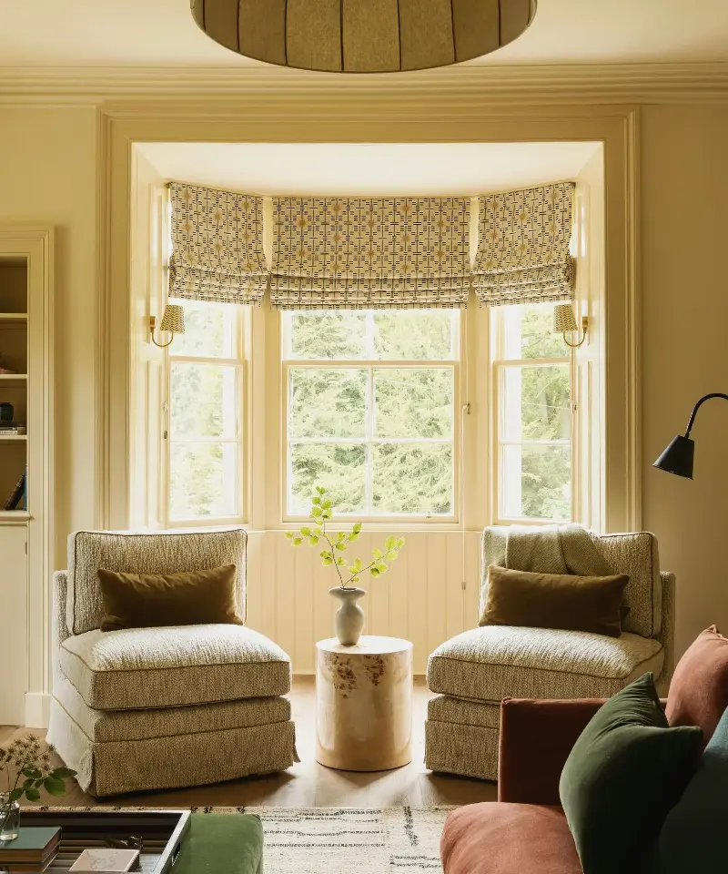 Low-slung and plush, slipper chairs are the graceful, historic furniture style cropping up in our schemes once again. (Image credit: &nbsp;Alexander Baxter / Fantoush)