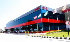 SLMG Beverages unveils Coca-Cola bottling plant in Buxar